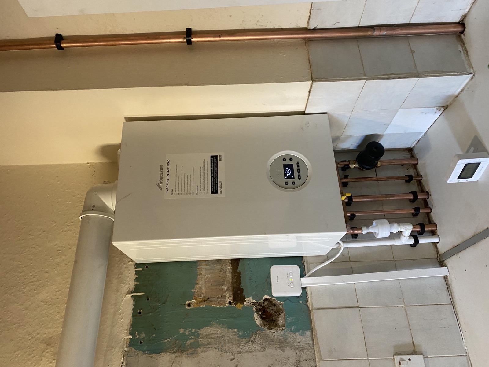 Real Worcester boiler installation with a neat wall finish by FlameTec